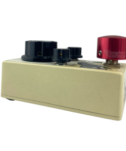 Barefoot Buttons V1 Tallboy Red footswitch topper installed on a guitar effects pedal switch.