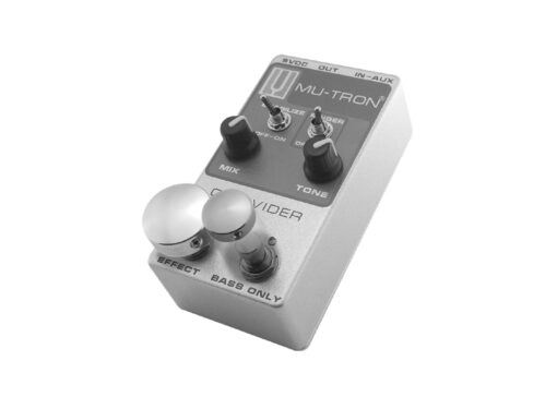 A Barefoot Button footswitch topper being fit onto a pedal switch