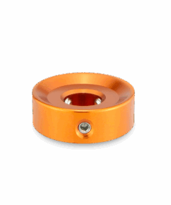 A yellow metal object with a black background.