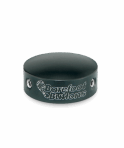 A black button with silver lettering on it.