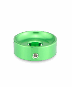 A green object is shown on the black background.