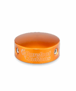 A orange plastic cap with the words barefoot tullens on it.