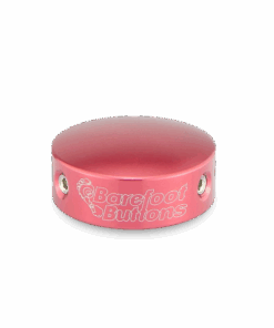 A pink button with the words barefoot buttons on it.