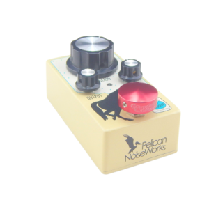 Barefoot Buttons V1 Standard Red footswitch topper installed on a Pelican Noiseworks guitar effects pedal.