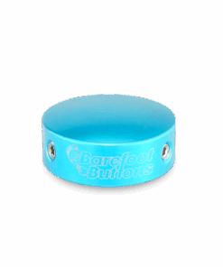 A blue bracelet with the word " barefoot " written on it.