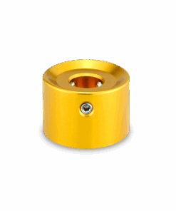 A yellow metal object with a hole in it.