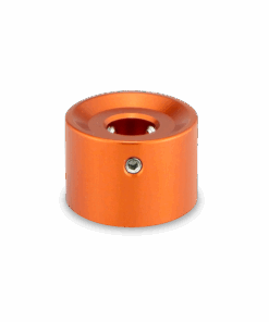 A close up of an orange object on a black background