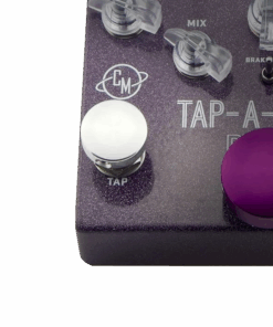 A purple and white button on the top of a guitar pedal.