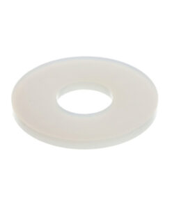 A white washer sitting on top of a floor.