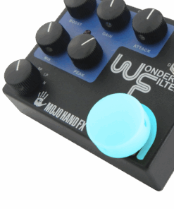 A blue button is on the top of a guitar pedal.