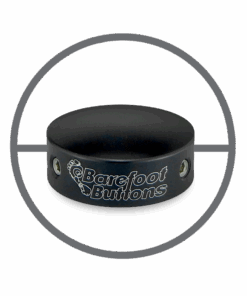 A black button with the words barefoot buttons on it.