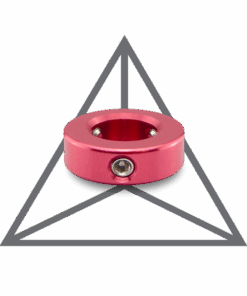 A pink metal object sitting in front of a silver triangle.
