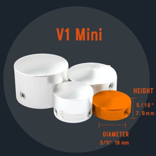 A picture of the size and shape of the v 1 mini in comparison to a group of differing sized barefoot buttons.