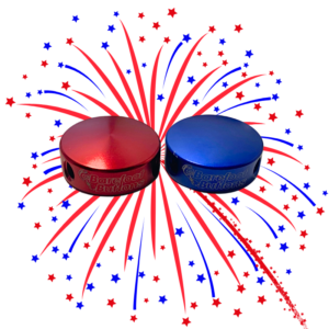 An image of a red and blue V1 Mini Barefoot Button with a firework in the background