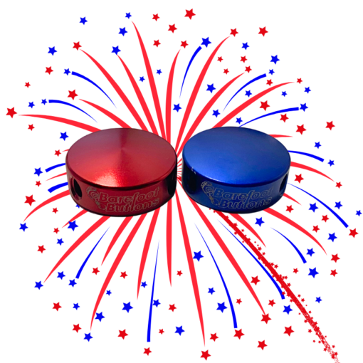 An image of a red and blue V1 Mini Barefoot Button with a firework in the background