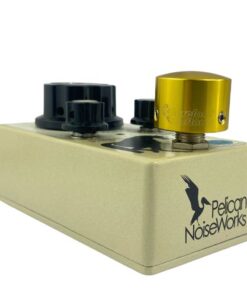 Barefoot Buttons V1 Tallboy Gold footswitch topper installed on an angled guitar effects pedal switch