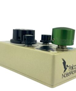 Barefoot Buttons V1 Tallboy Green footswitch topper installed on an angled guitar effects pedal switch