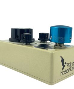 Barefoot Buttons V1 Tallboy Light Blue footswitch topper installed on an angled guitar effects pedal switch