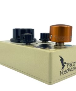 Barefoot Buttons V1 Tallboy Orange footswitch topper installed on an angled guitar effects pedal switch