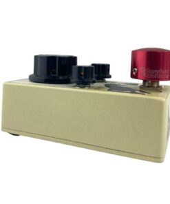 Barefoot Buttons V1 Tallboy Red footswitch topper installed on an angled guitar effects pedal switch