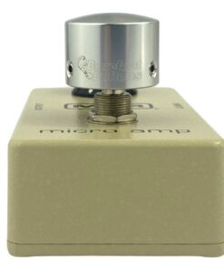 Barefoot Buttons V1 Tallboy Silver footswitch topper installed on a guitar effects pedal switch, straight-on view