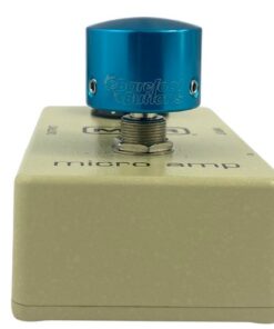 Barefoot Buttons V1 Tallboy Light Blue footswitch topper installed on a guitar effects pedal switch, straight-on view