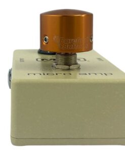 Barefoot Buttons V1 Tallboy Orange footswitch topper installed on a guitar effects pedal switch, straight-on view