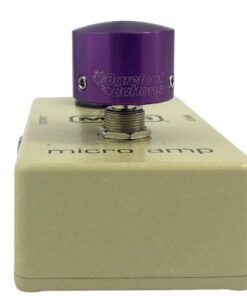 Barefoot Buttons V1 Tallboy Purple footswitch topper installed on a guitar effects pedal switch, straight-on view
