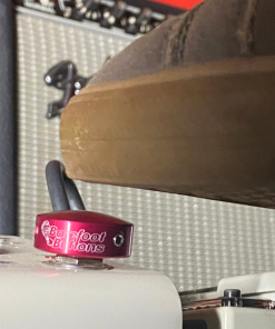 Barefoot Buttons V1 Standard Red footswitch topper installed on guitar pedal being pressed with shoe